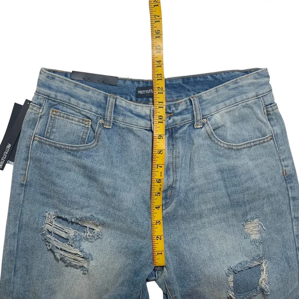 PrettyLittleThing | Women | Light Wash Extreme Distressed Mom Jeans | Size 29